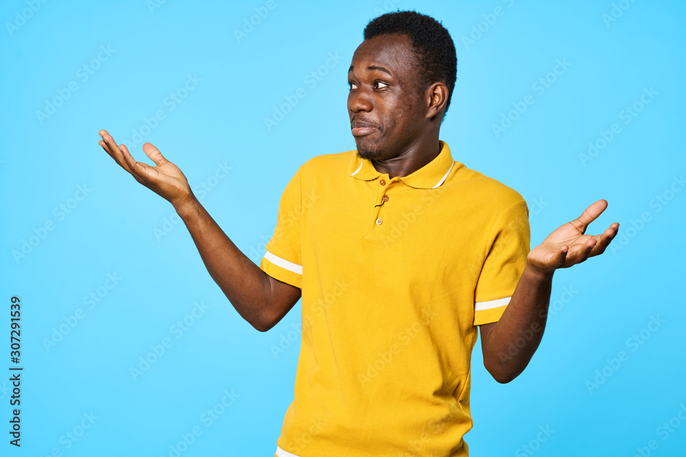 young man with arms raised young man with arms raised