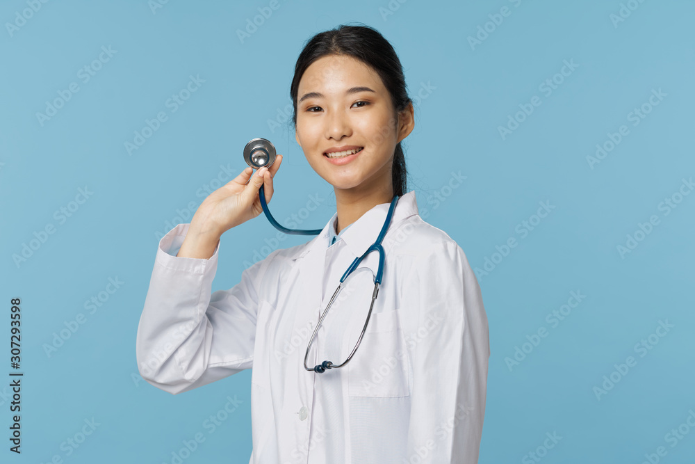portrait of a young doctor with stethoscope portrait of a young doctor with stethoscope
