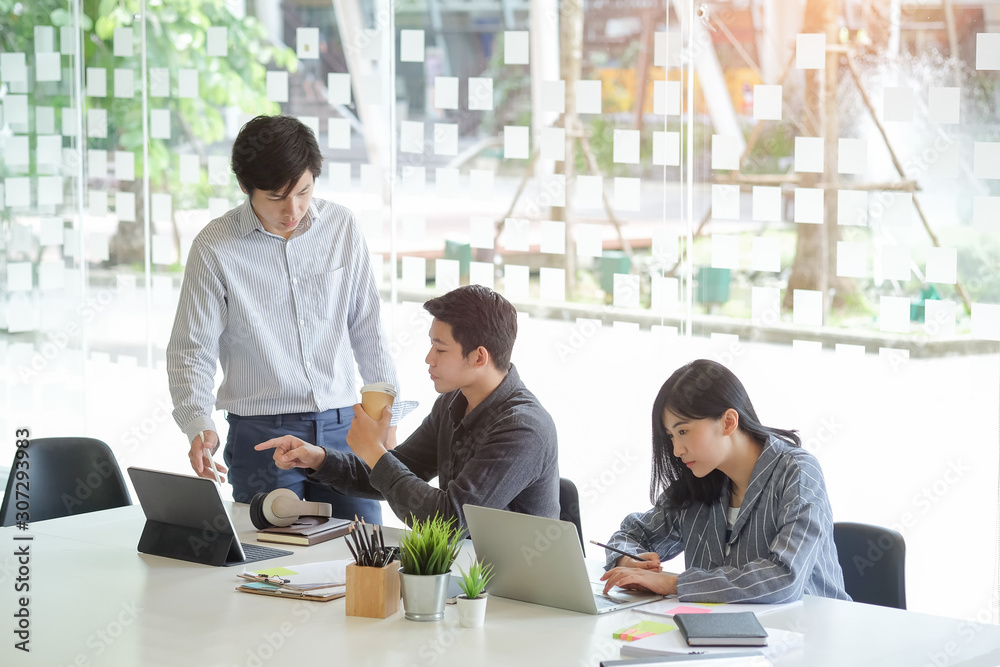 Business working in office with documents and laptop people Consulting and business planning.