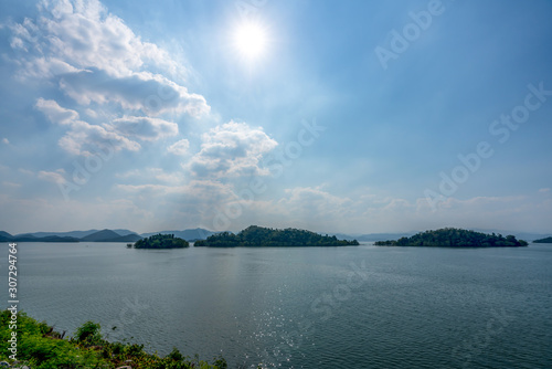 beautiful blue sky green forest mountains lake view at Kaeng Krachan National Park, Thailand. an idea for backpacker hiking on long weekend or a couple, family activity camping holiday relaxing