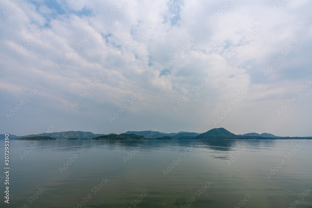 beautiful blue sky green forest mountains lake view at Kaeng Krachan National Park, Thailand. an idea for backpacker hiking on long weekend or a couple, family activity camping holiday relaxing beautiful blue sky green forest mountains lake view at Kaeng Krachan National Park, Thailand. an idea for backpacker hiking on long weekend or a couple, family activity camping holiday relaxing