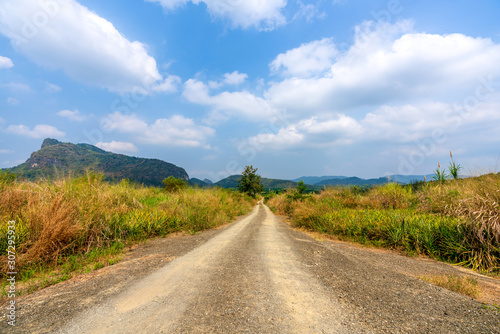 beautiful blue sky green forest mountains lake view at Kaeng Krachan National Park, Thailand.  an idea for backpacker hiking on long weekend or a couple, family activity camping holiday relaxing © Tony