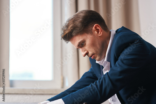 businessman sitting at desk in office