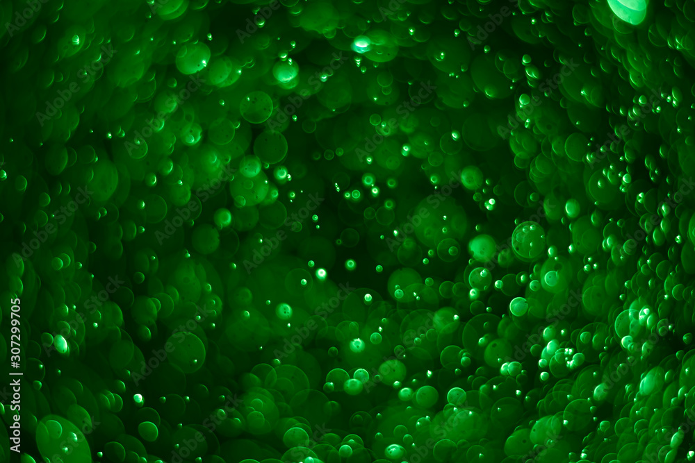Abstract bokeh lights with light green background
