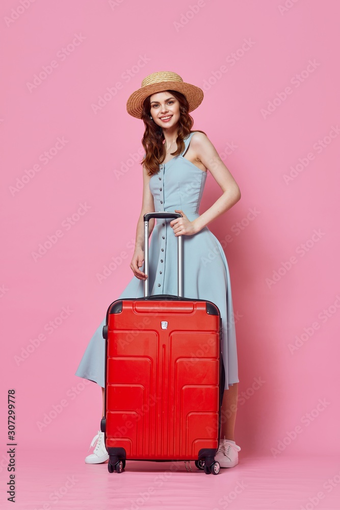 young woman with suitcase isolated on white young woman with suitcase isolated on white