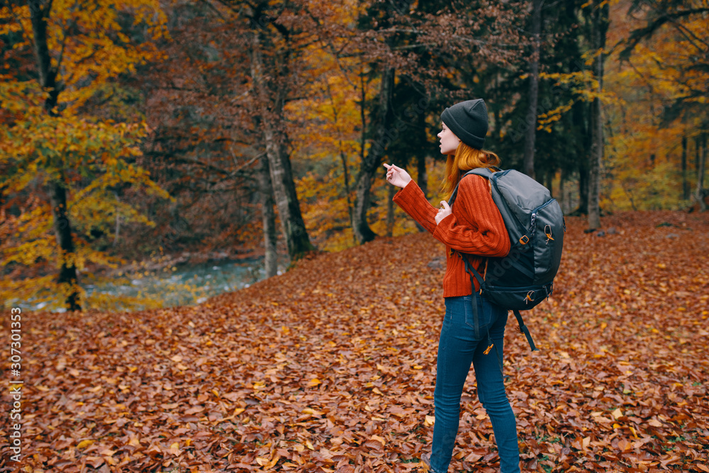 man with camera in autumn forest man with camera in autumn forest