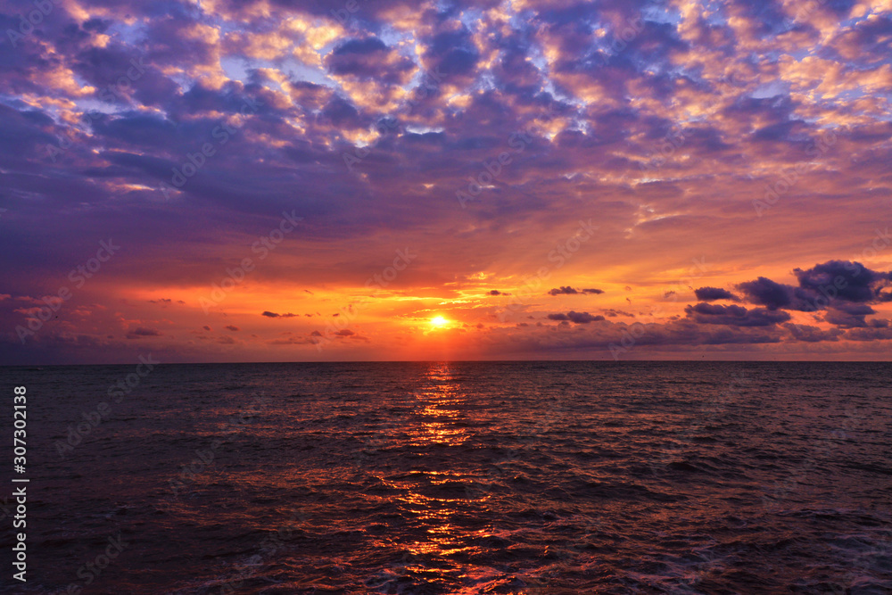 Fototapeta premium sunrise at the sea with beautiful colors