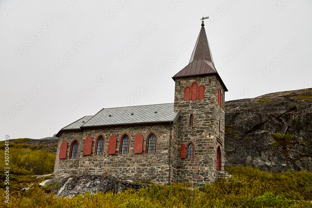 Stone Church in the mountains in the evening outdoors in summer, spring or autumn