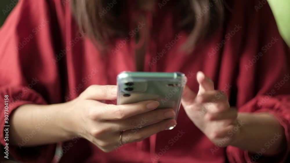 Closeup hand of woman using smartphone for chat or social media. Closeup hand of woman using smartphone for chat or social media.