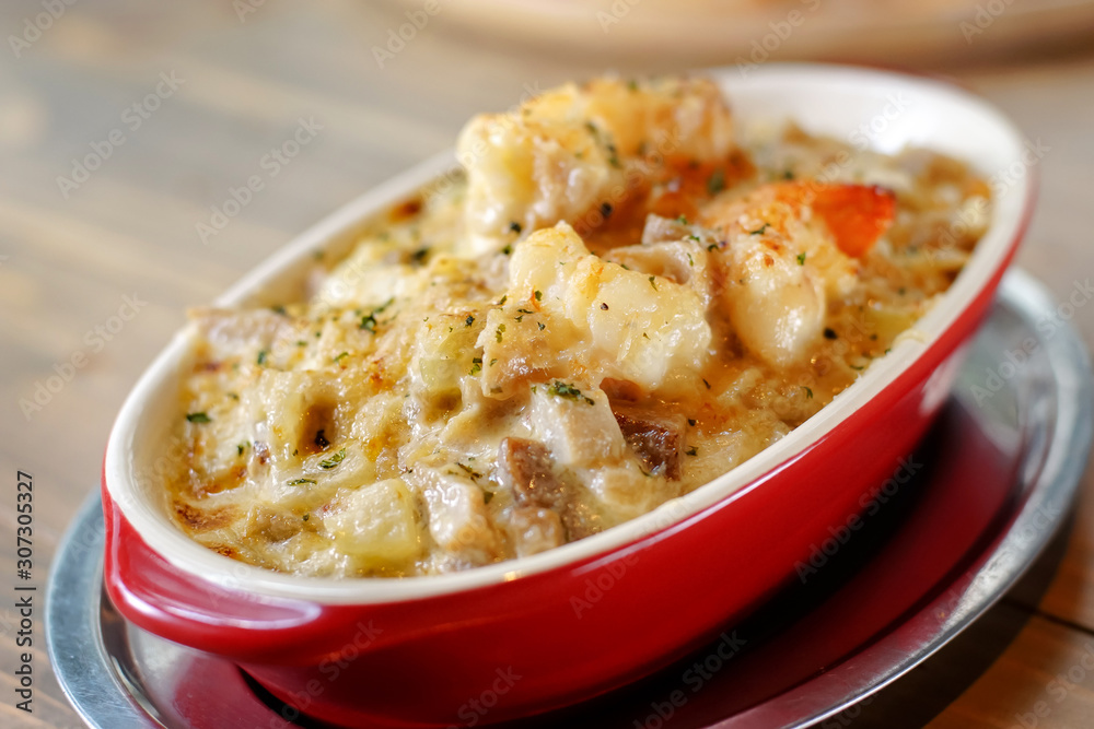 Golden baked seafood tomyum lasagna - Thai Italian fusion food Golden baked seafood tomyum lasagna - Thai Italian fusion food