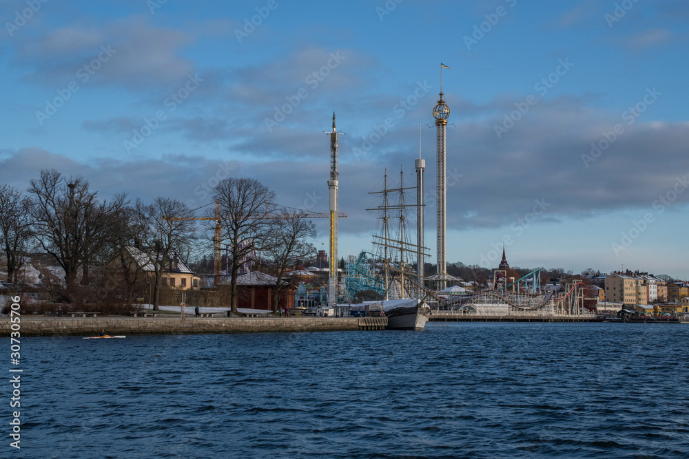 Water view over Stockholm inner harbour an winter day in pale light