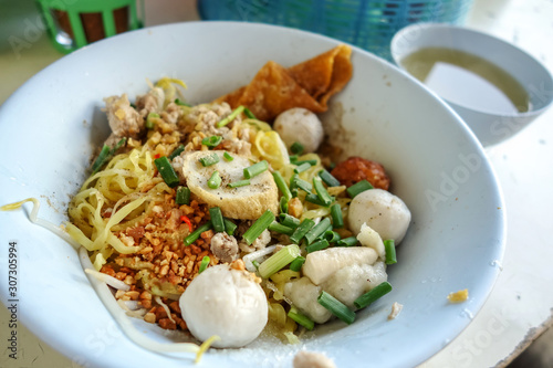 Egg Noodles with fish ball topped with spring oion -Thai-Chinese street food
