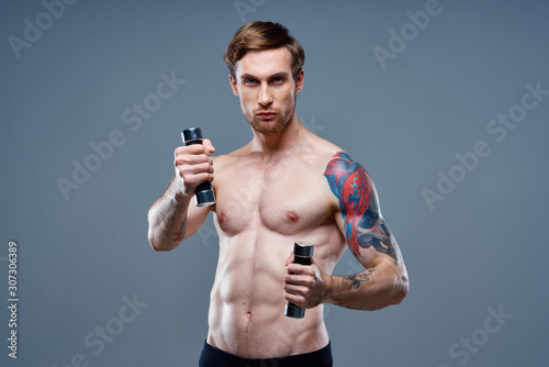 man with dumbbells