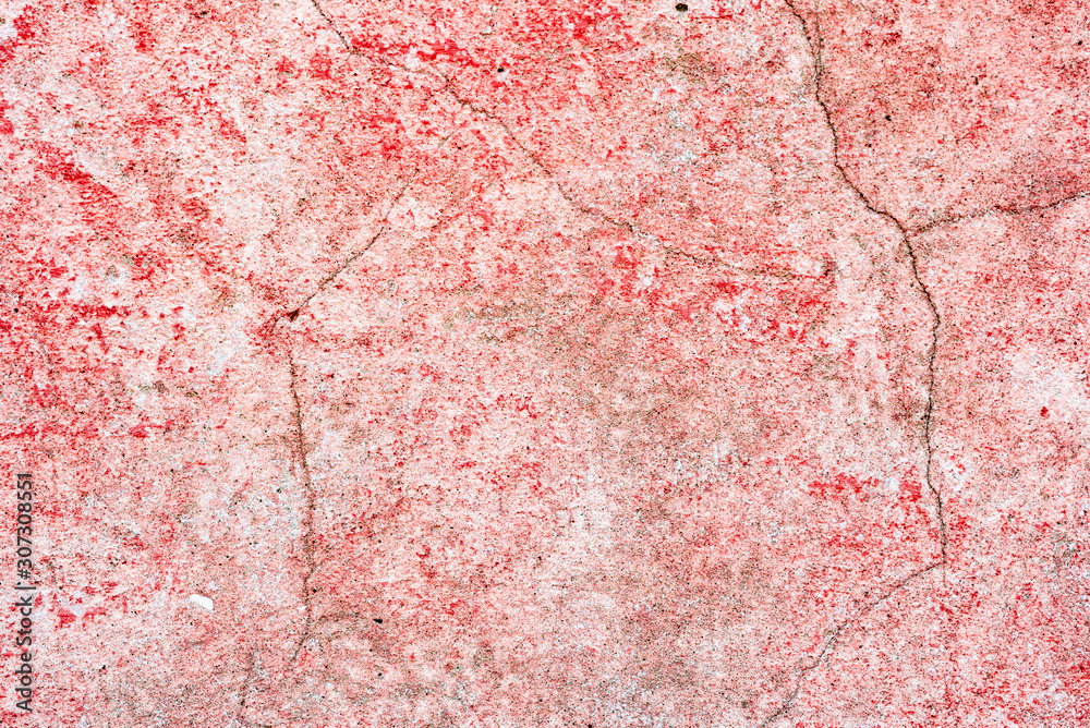 Naklejka premium Texture of a concrete wall with cracks and scratches which can be used as a background