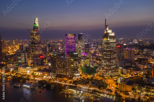Beautiful skyline with buildings and lights at night in Saigon