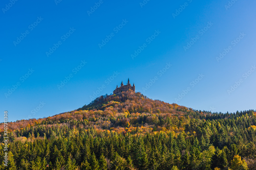 Fototapeta premium Germany Hohenzollern Castle is a hilltop castle located on the Mount Hohenzollern. It is 855m above sea level and we can see the castle from everywhere.