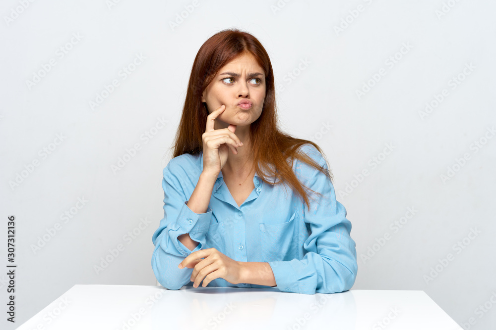 portrait of a young woman sitting on sofa portrait of a young woman sitting on sofa