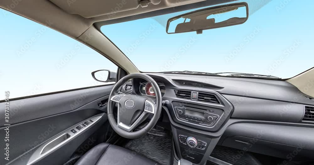 panorama in interior leather salon of prestige modern car. steering wheel, shift lever and dashboard