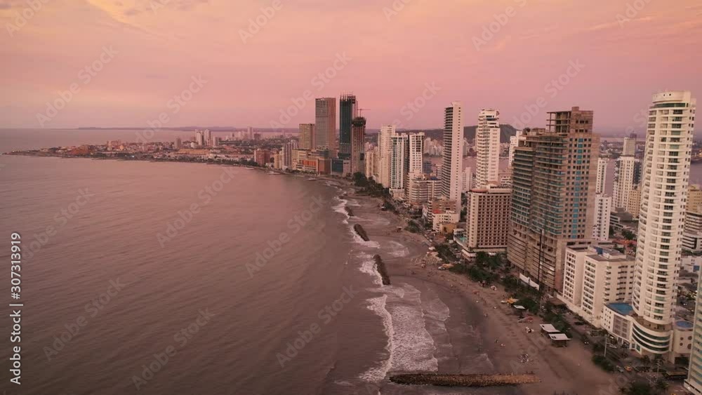 An aerial shot of the sun setting on the skyline of Cartagena, Colombia. An aerial shot of the sun setting on the skyline of Cartagena, Colombia.