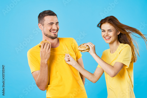 happy couple with hamburger