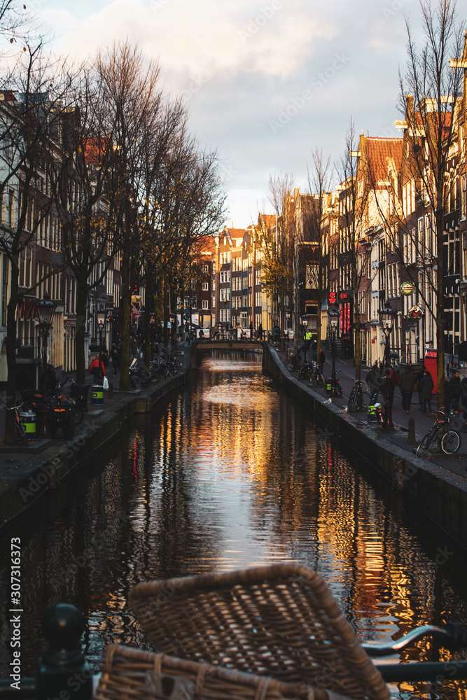 View of canal at sunset in Amsterdam