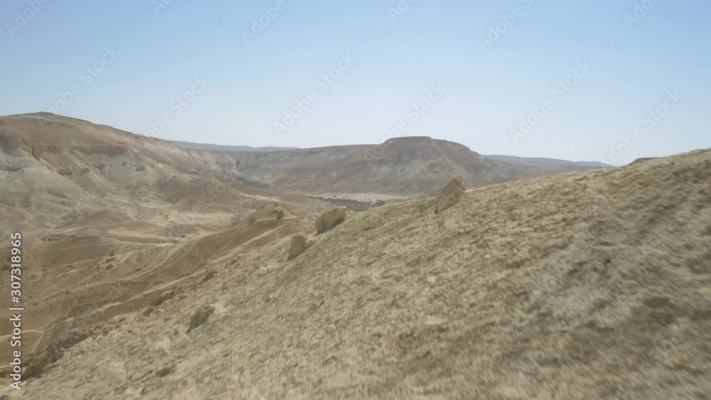 Beautiful mountain landscape during sunny day. Aerial flying Beautiful mountain landscape during sunny day. Aerial flying