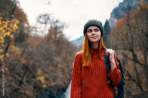 portrait of young woman in autumn park