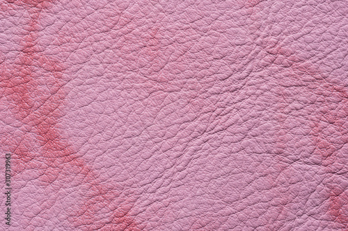 Pink leather background. Natural leather 