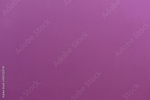 Purple concrete wall background and texture