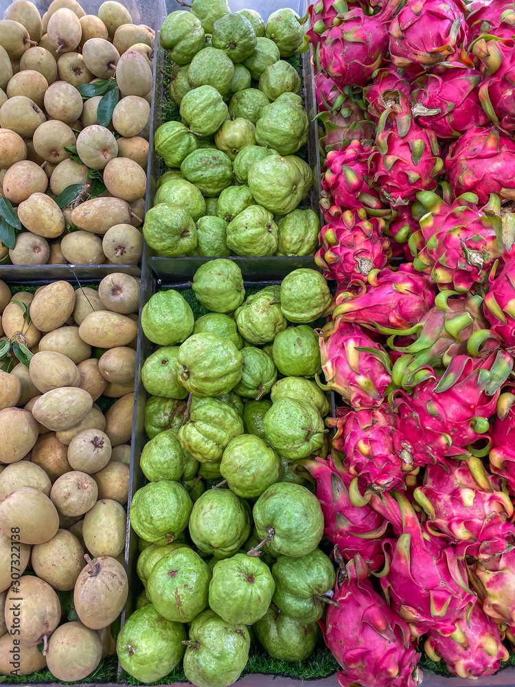 Mammee apple, guava and red dragon fruit in hypermarket Mammee apple, guava and red dragon fruit in hypermarket