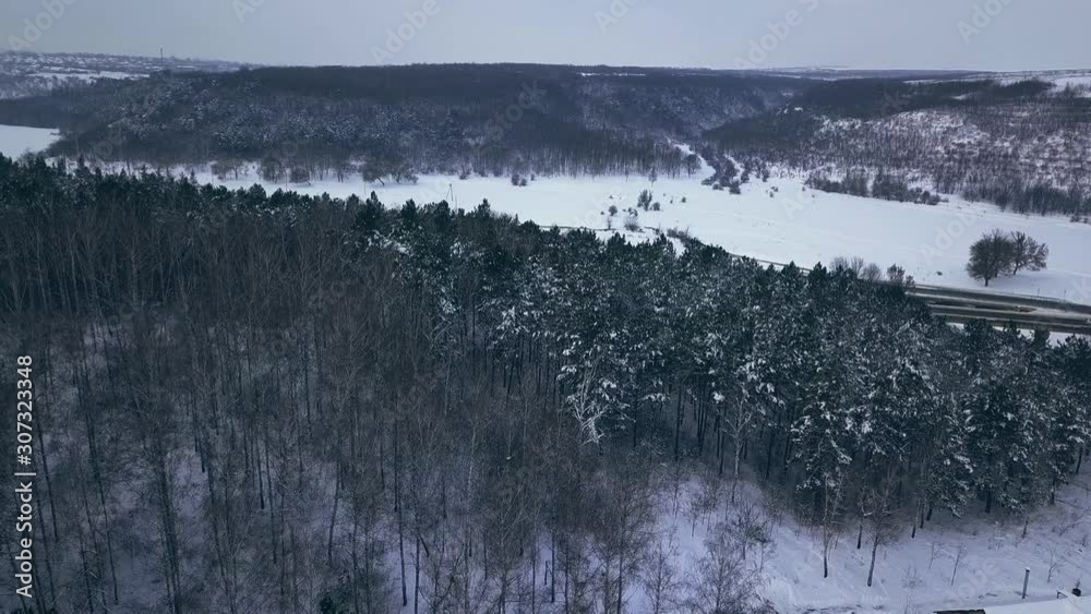 Aerial or top view from a drone on a highway in winter weather Aerial or top view from a drone on a highway in winter weather