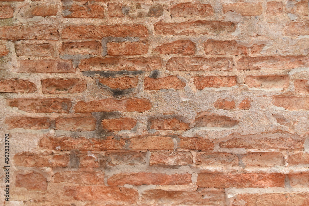 Old red brick wall background Old red brick wall background