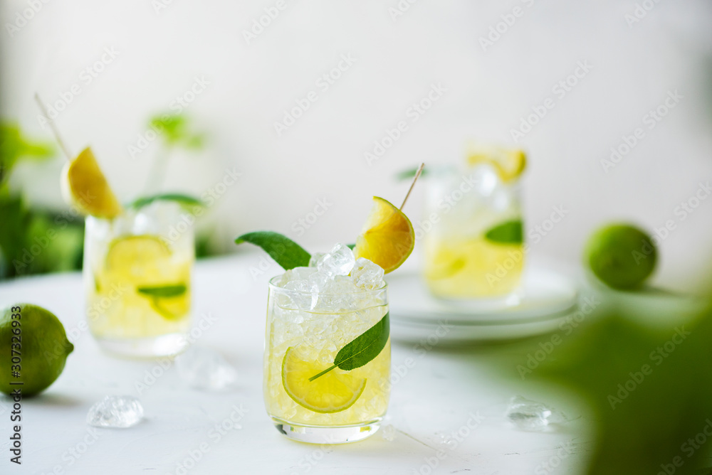 Summer cocktail with sage and lime
