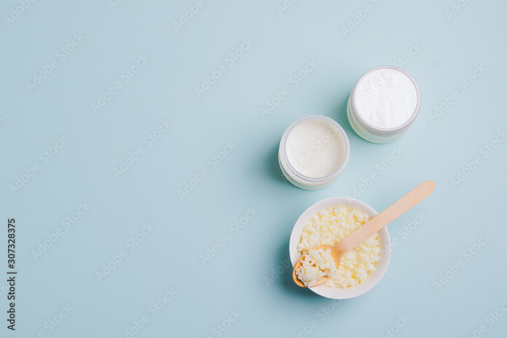 Fototapeta premium Milk mushroom organic probiotic fermented milk products glass bowl. Fermented foods healthy eating concept. Copy space.