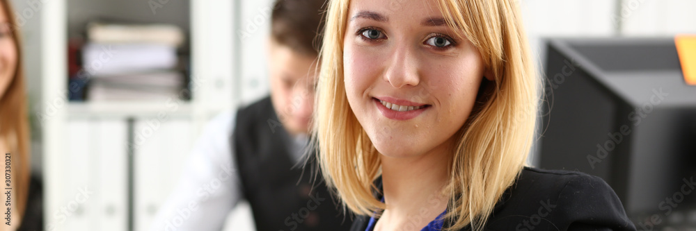 Beautiful smiling cheerful girl at workplace Beautiful smiling cheerful girl at workplace