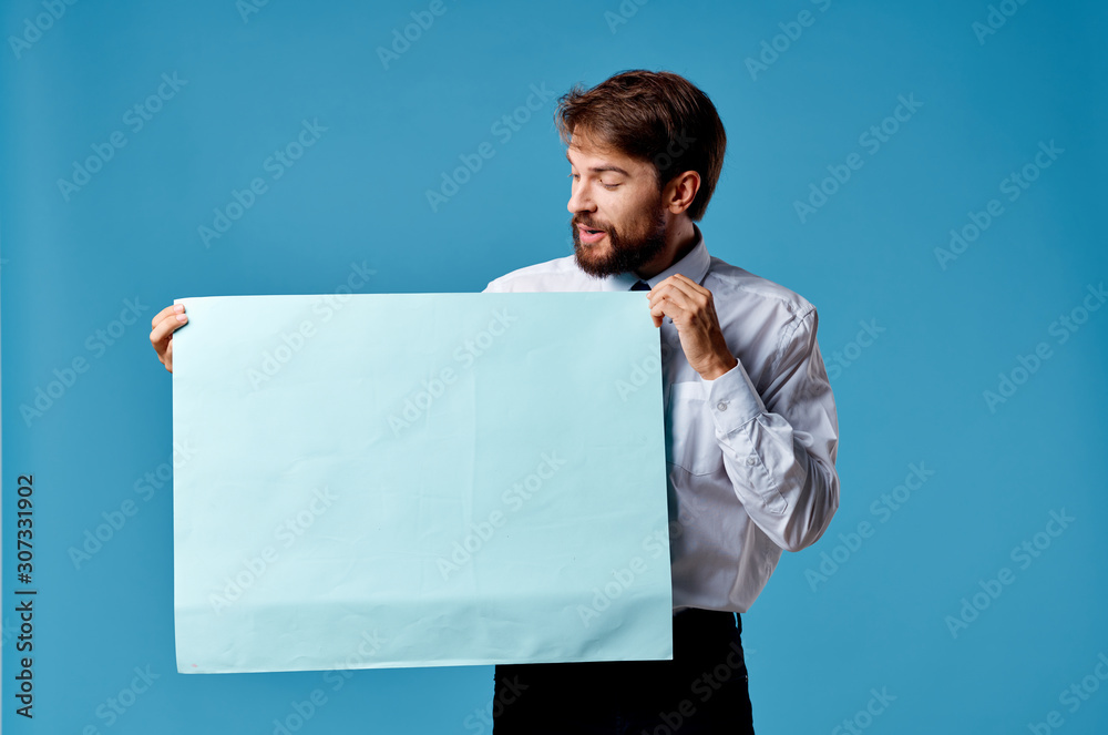 man holding white board man holding white board
