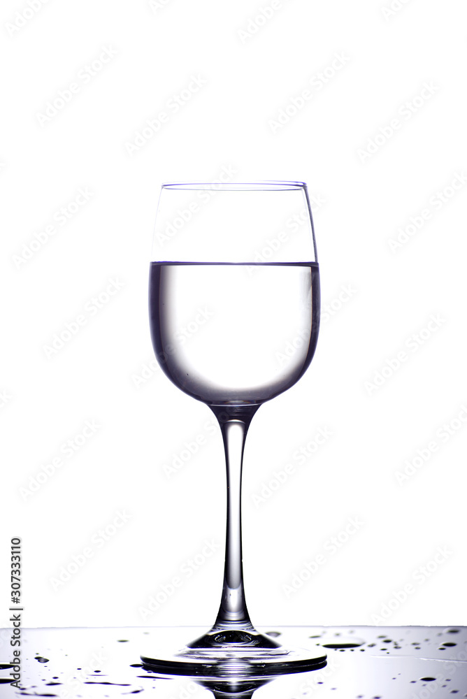 Glass with water isolated on a white background Glass with water isolated on a white background