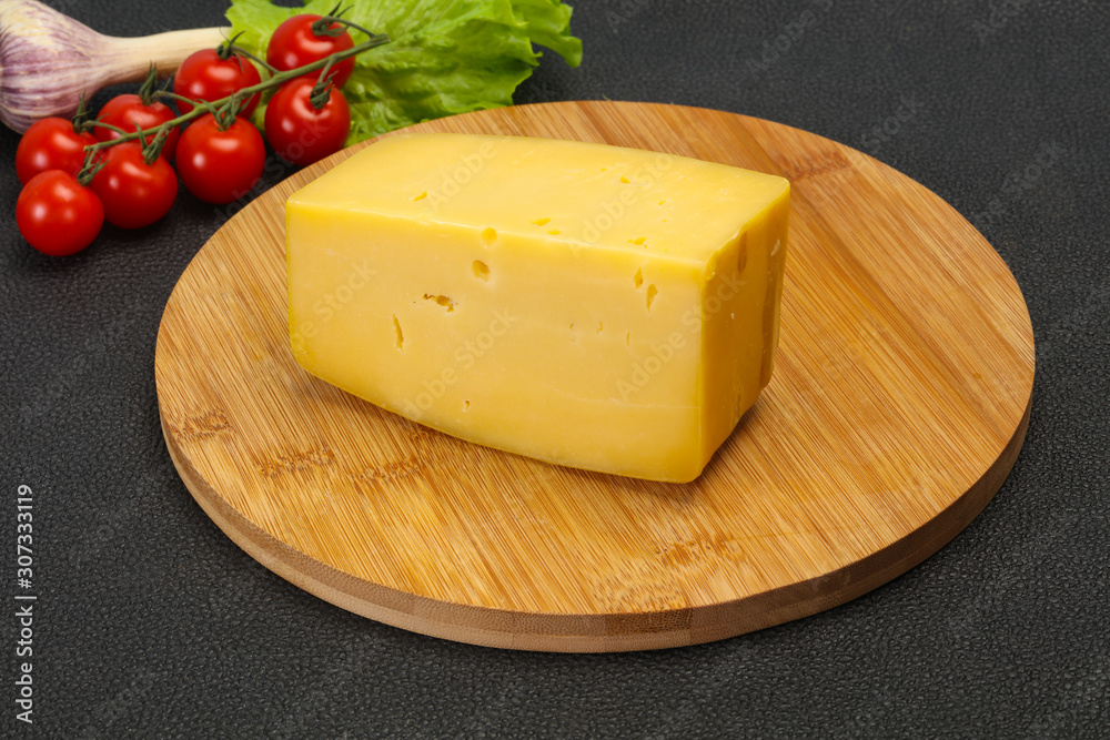 Hard yellow tasty cheese brick Hard yellow tasty cheese brick
