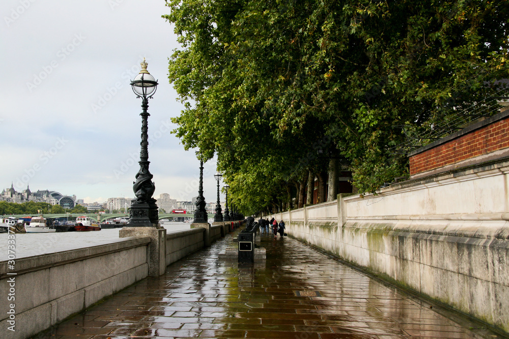 Street lamp on the embankment of the river