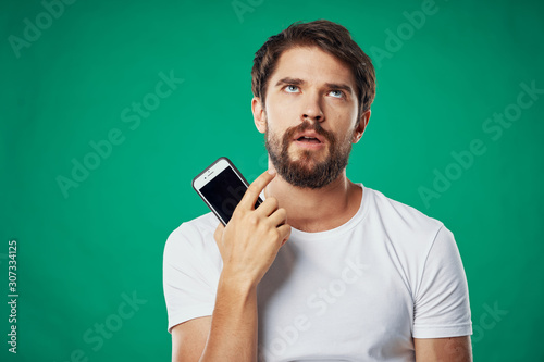 young man with mobile phone © SHOTPRIME STUDIO