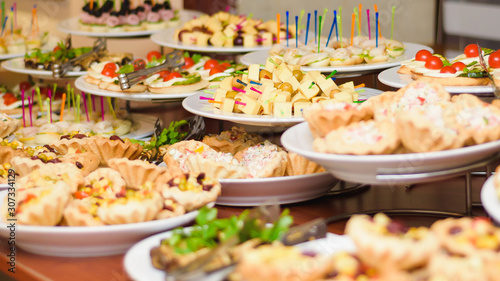 food buffet in restaurant, snack at the conference, concept catering © conssuella