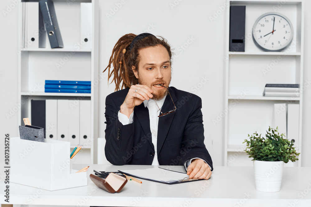businesswoman talking on phone in office businesswoman talking on phone in office