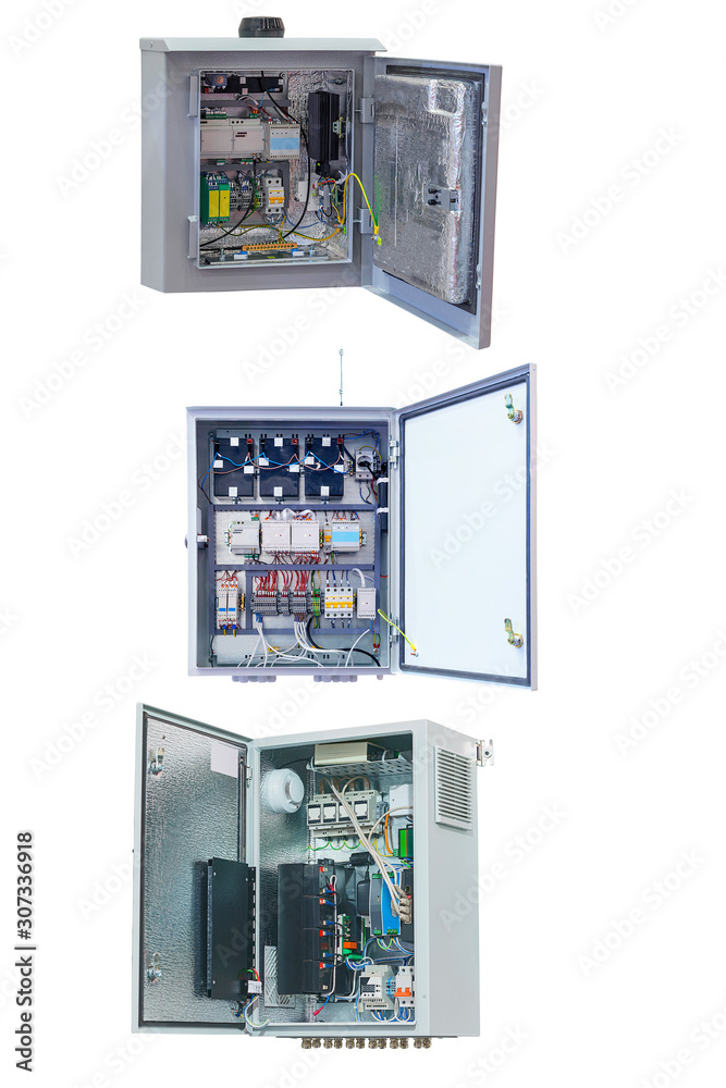 three electrical control Cabinet with an open door isolated on a white background