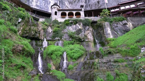 Waterfall at St. Beatus Caves in Switzerland photo