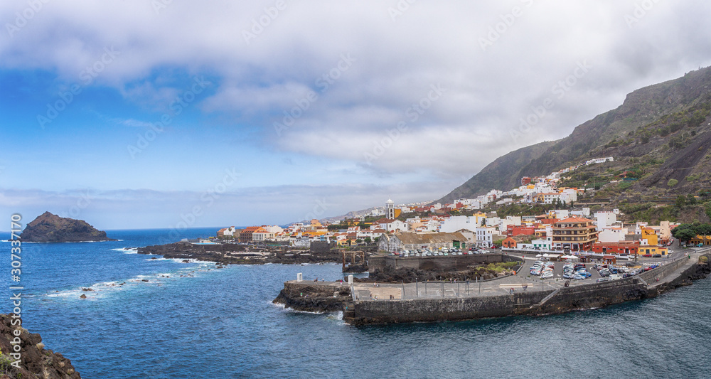 Coastal view of Garachico, small village in the north of Tenerife. Panoramic Canary Islands town background.