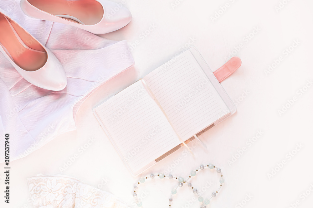 Wedding flat lay, womans stylish fashion accessories in biege colors, white background,copy space.Bridal details concept Wedding flat lay, womans stylish fashion accessories in biege colors, white background,copy space.Bridal details concept