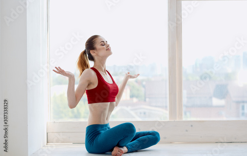 young woman doing fitness exercise