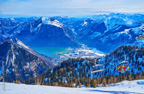 Alpine winter landscape with chairlift of Feuerkogel Mount, Ebensee, Salzkammergut, Austria photo