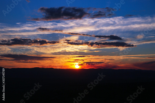 Colourful sunset over the Great Dividing Range near Canberra, Australia. © Norman