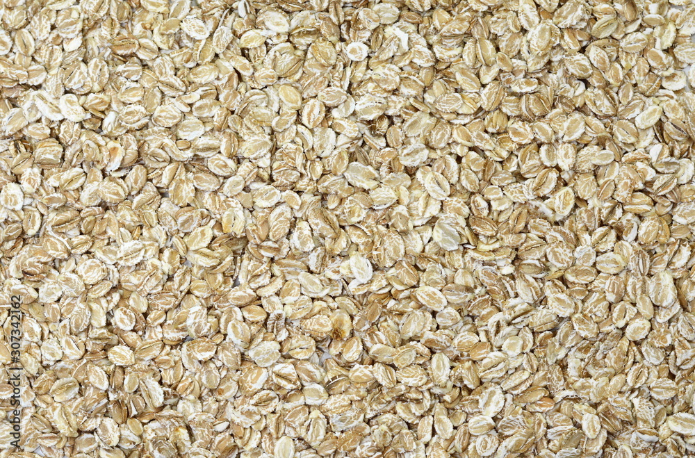 Rye oat flakes isolated on white , macro close up Rye oat flakes isolated on white , macro close up